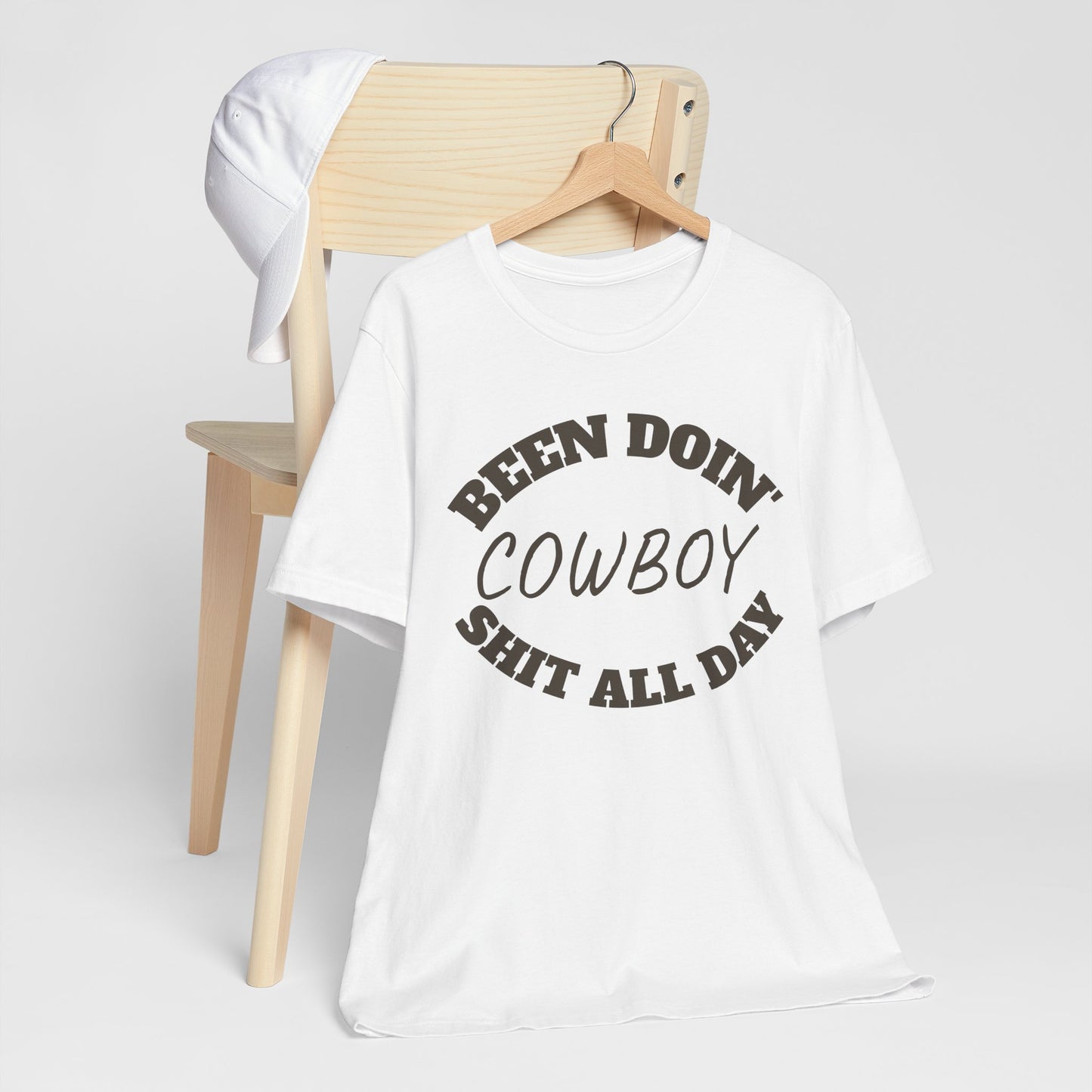Cowboy Humor Unisex Tee - "Been Doin' Cowboy Shit All Day"
