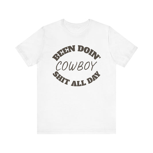 Cowboy Humor Unisex Tee - "Been Doin' Cowboy Shit All Day"